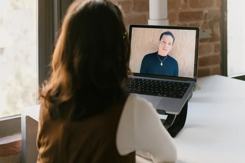 A sailboat at sea during sunset